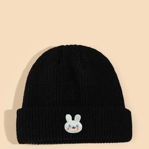 This is a black beanie with a little white bunny logo on the front.